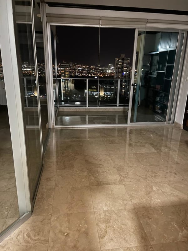 Contemporary hallway with marble flooring and designer finishes in PH Titanium Costa del Este Panama