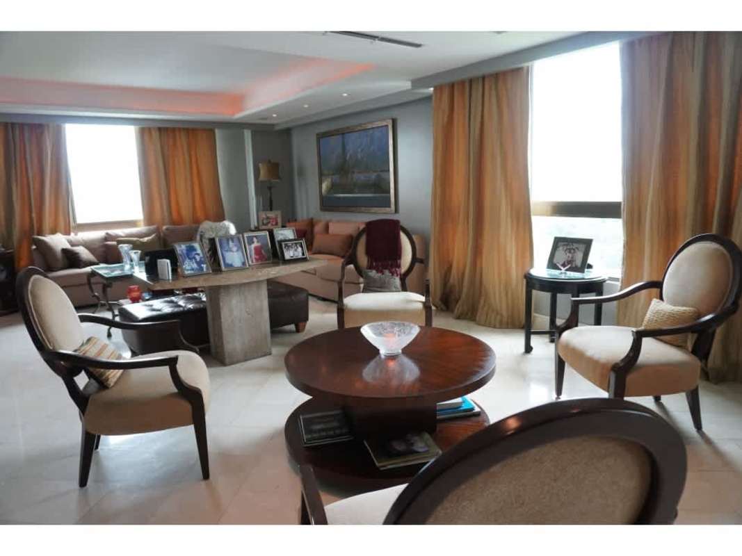 Elegant formal living room with ample seating, ceiling lighting, golf view windows in PH Golf Tower Panama