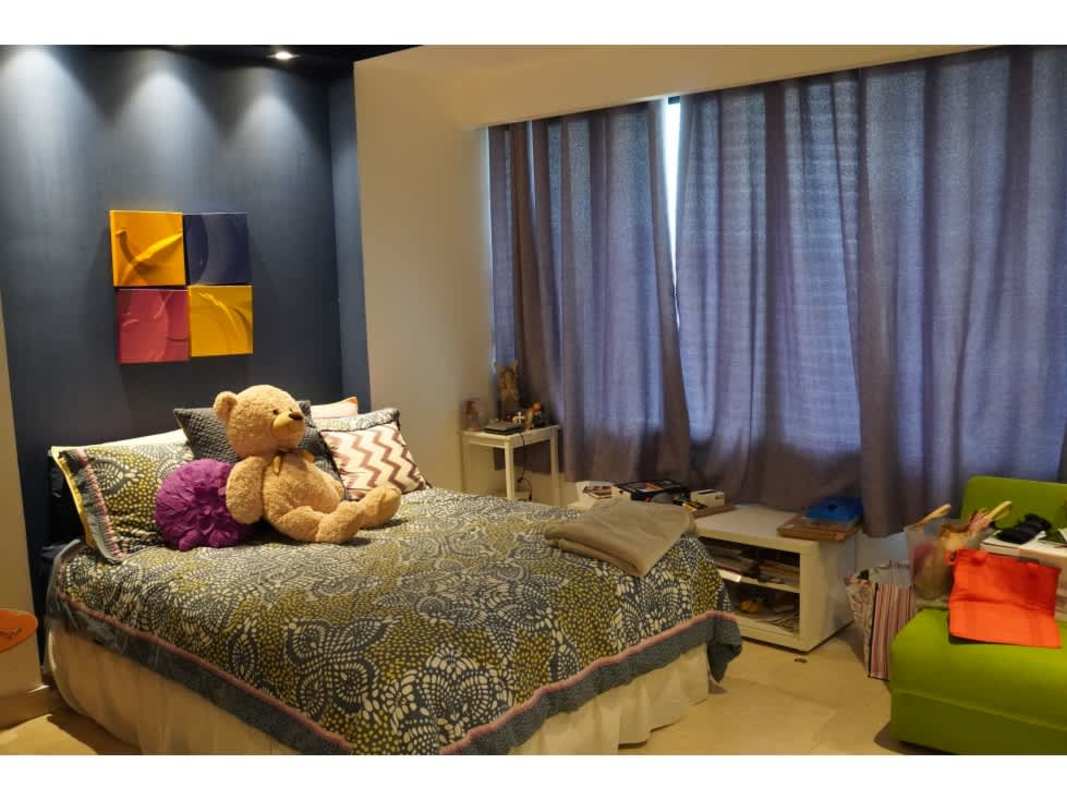 Modern guest bedroom with floor-to-ceiling window at PH Golf Tower, Altos del Golf Panama