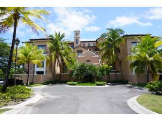 Modern living room with large windows and golf course views at Bristol Residences Buenaventura Panama