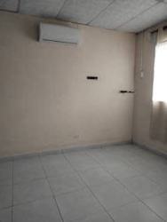 Bedroom with air conditioner and curtains in house for sale Brisas de Arraiján Panama