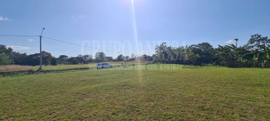 Flat serviced lot for sale Rio Hato with partial fencing, mountain views, near beaches