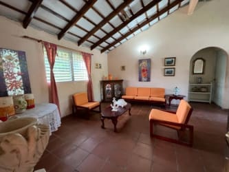 Beautiful swimming pool with gazebo surrounded by tropical gardens at Coronado Beach Panama