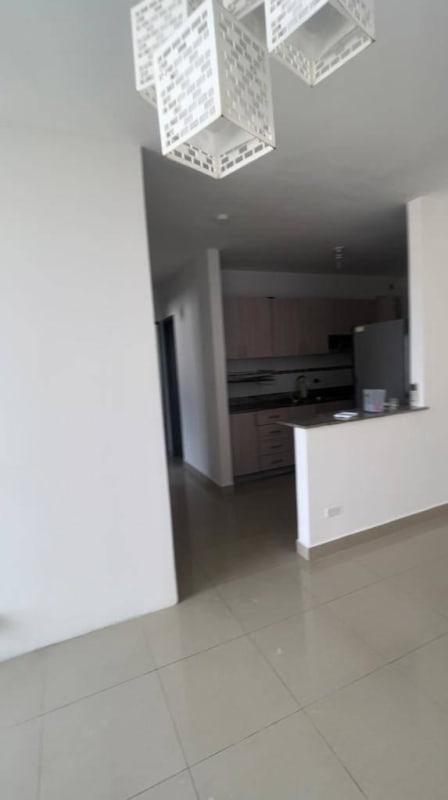 Bright open kitchen and dining space granite countertop villa zaita condo panama
