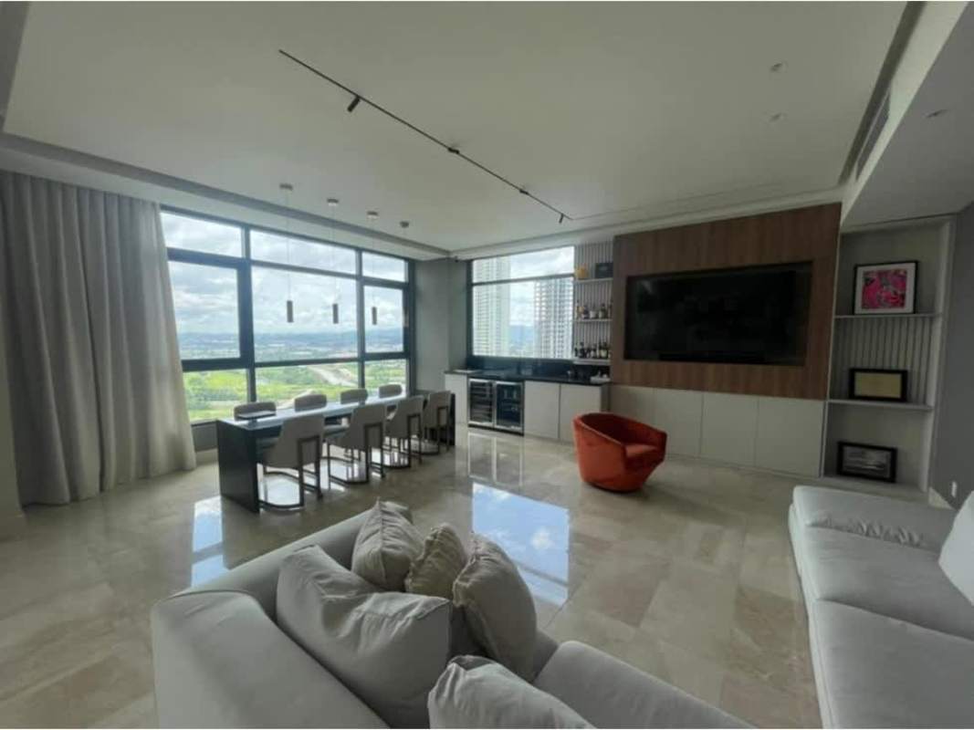 Large terrace with seating area overlooking golf course in Santa María Panama apartment