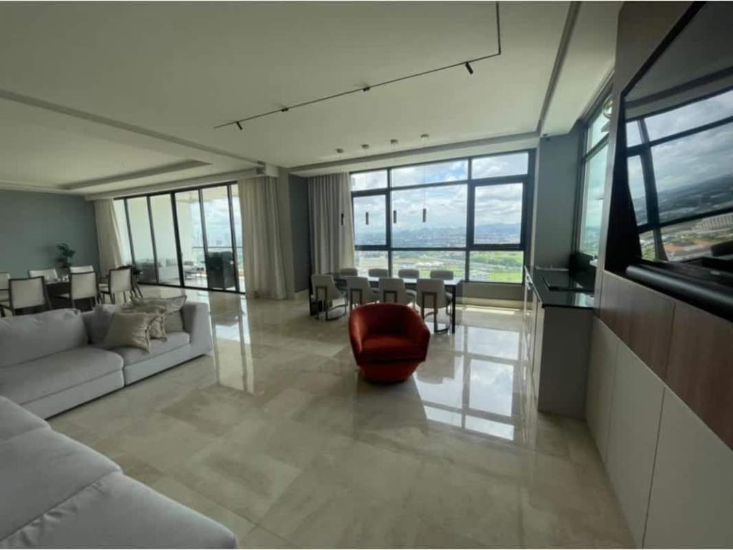 Minimalist kitchen with quartz island, built-in appliances, and golf view at PH Albatross Panama