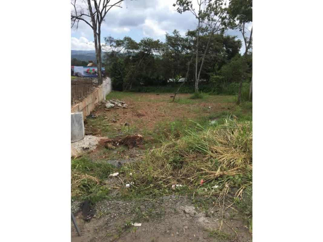 Gas station next to Villabos lot in Pedregal with canopy and sign