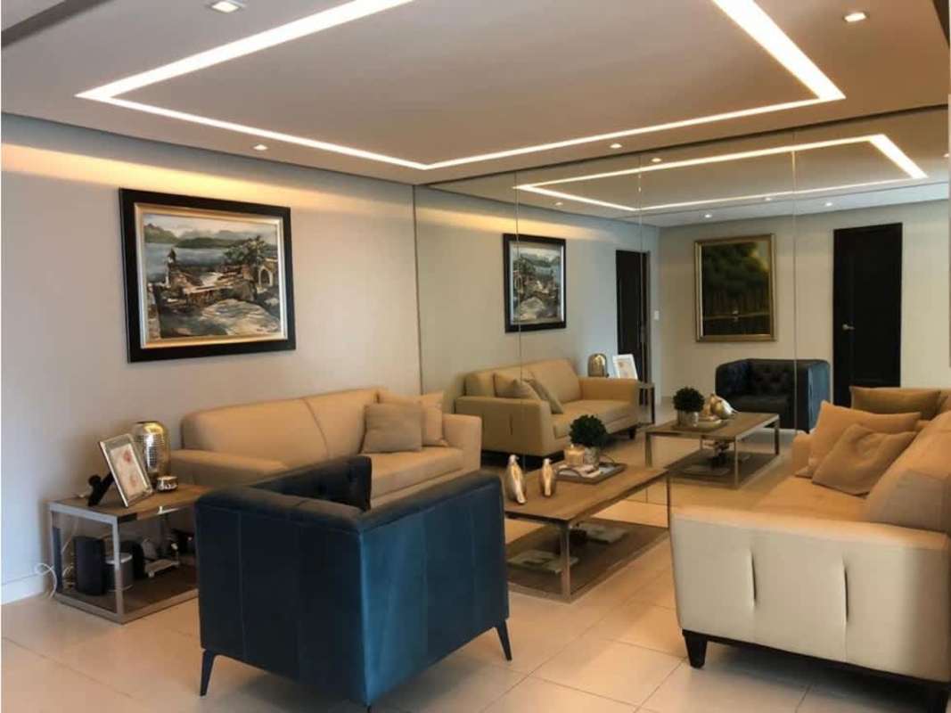 Modern open kitchen with granite island counters in PH Tao Coco del Mar Panama