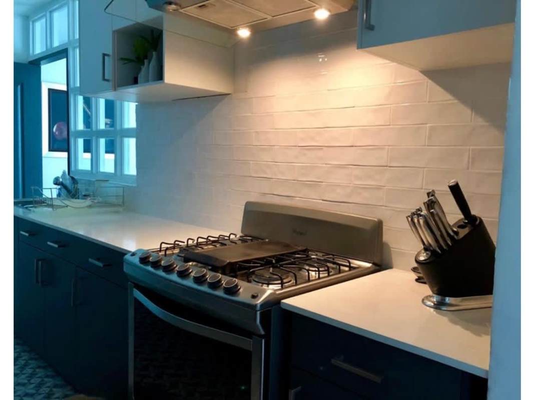 Modern kitchen with stove oven and hood PH Tao Coco del Mar Panama
