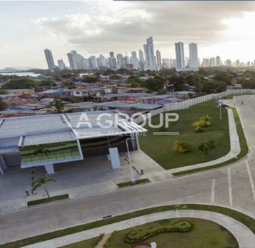 Commercial buildings with solar panels and greenery aerial shot at Panamá Viejo Business Center