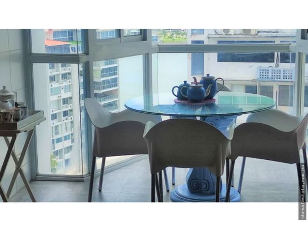 Bright contemporary bedroom with tufted bed PH Vista del Sol Panama