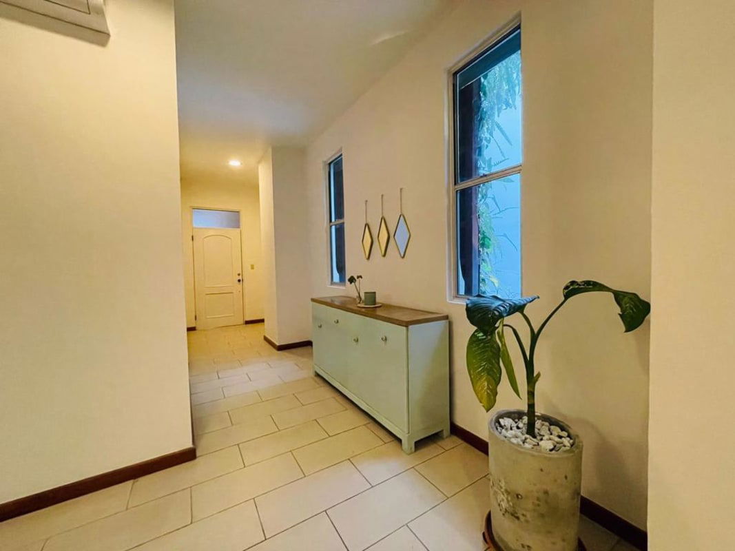 Modern tiled bathroom with walk-in shower and vanity in PH Casco Viejo San Felipe