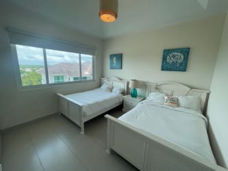 Children's room with bunk bed and tropical decor Quarry Heights Bijao Panama