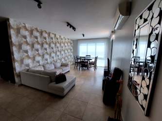 Fully equipped modern kitchen with granite countertops and appliances in Playa Blanca apartment