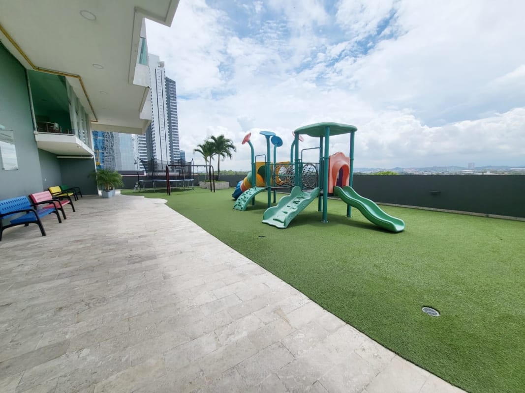 Outdoor swimming pool and lounge area in PH Latitude Costa del Este Panama