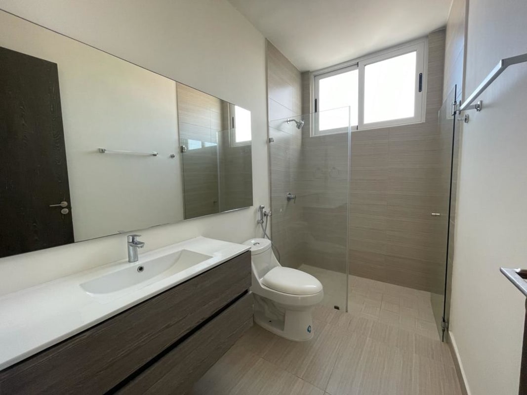 Granite kitchen with modern cabinets and stainless steel appliances in PH Asia Tower Costa del Este Panama