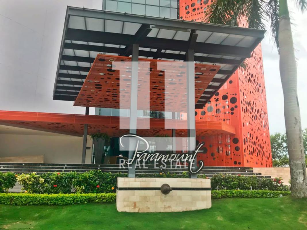 Master bathroom with jacuzzi tub and city view window at PH Paramount Costa del Este Panama