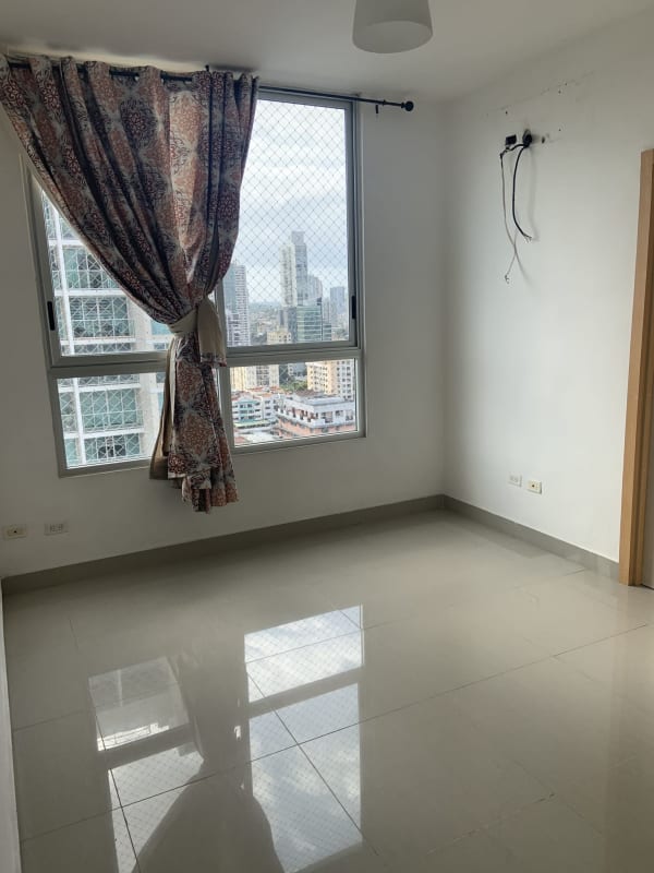Bathroom with glass enclosed shower and vanity in PH Firenze apartment Panama