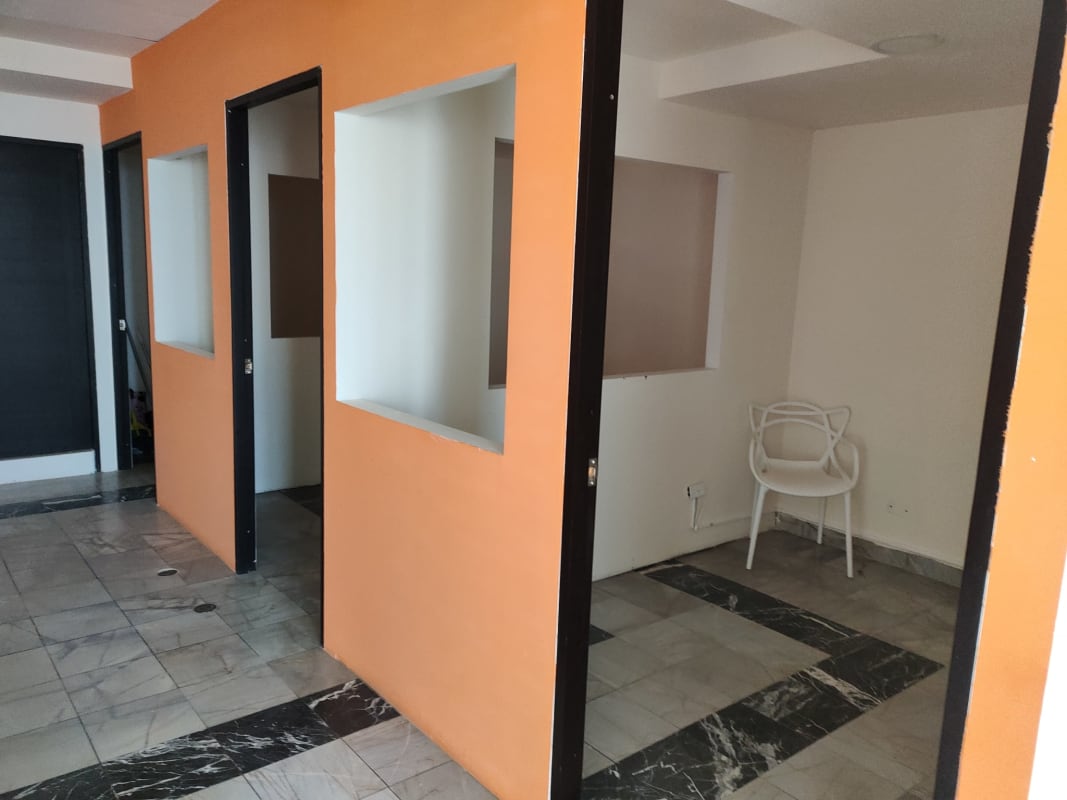 Private workspace with glass division marble flooring Torre BAC Panama