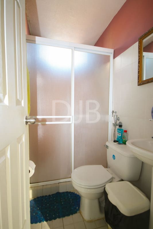 Kitchen and laundry area with appliances and storage PH Mystic Village Don Bosco Panama