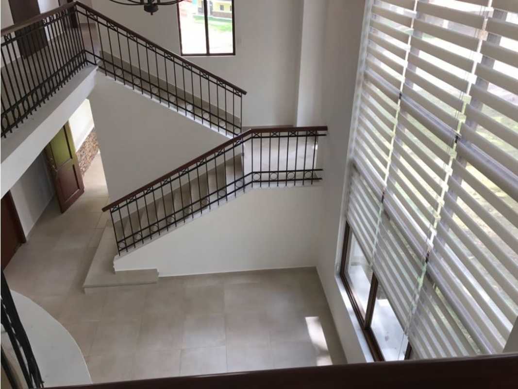 Spacious kitchen with granite countertops and wood cabinetry house Clayton Panama