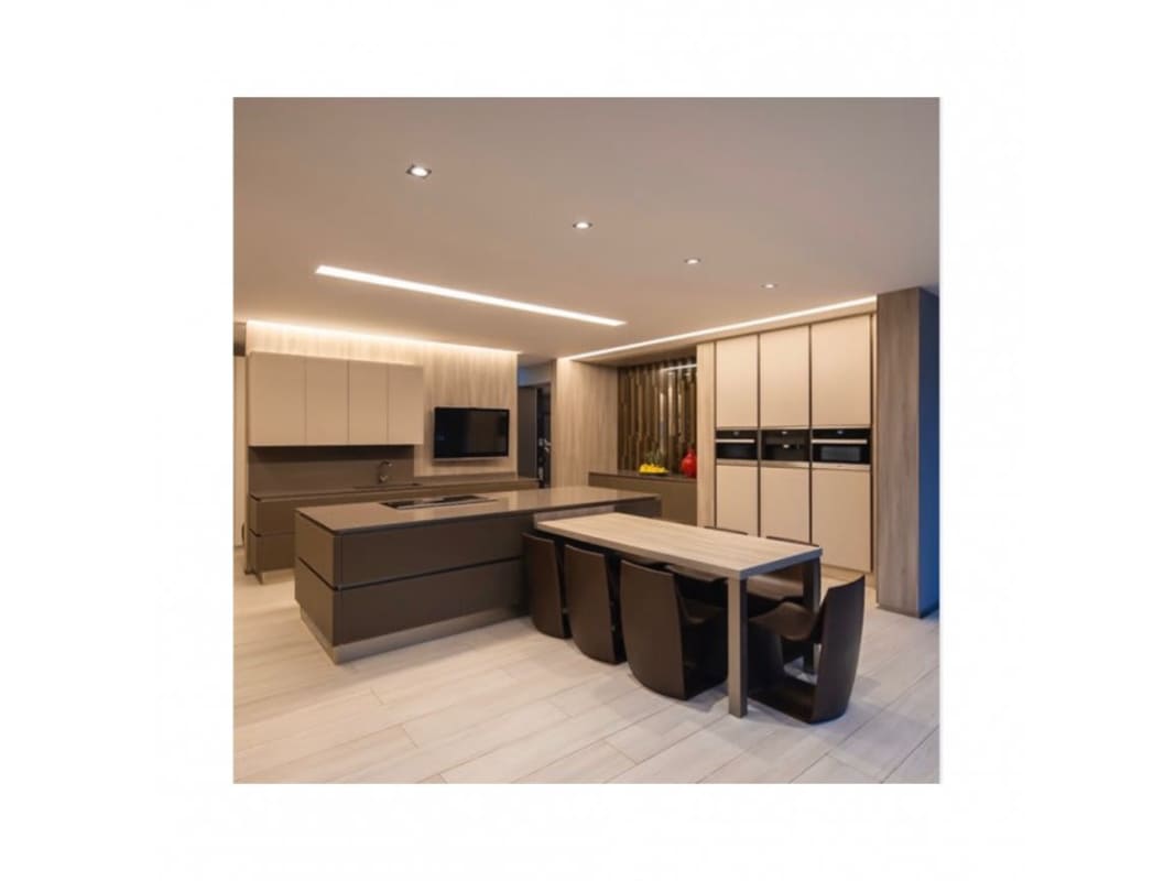 Modern kitchen with large island, breakfast bar, built-in appliances in luxury house Clayton Panama