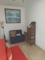 Bedroom with windows and ocean view in Farallón beachfront apartment Panama