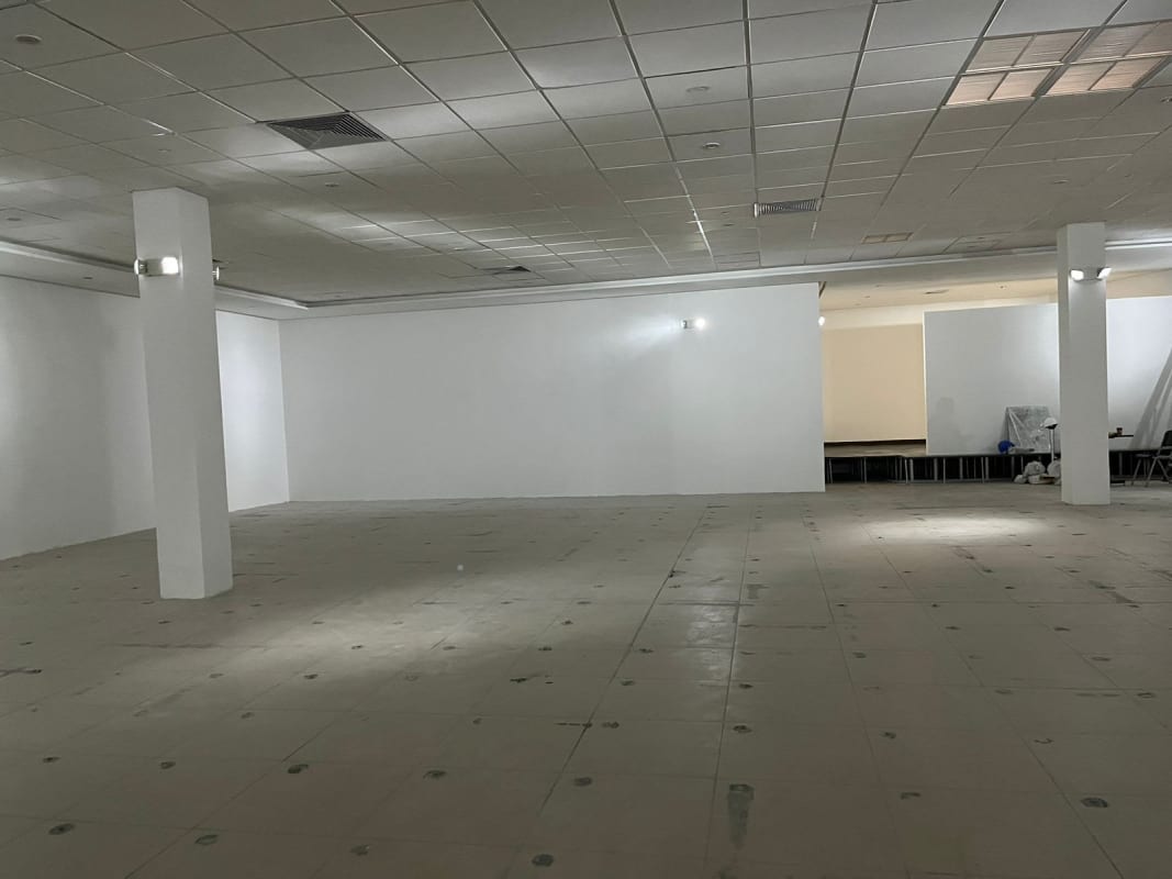 Commercial property interior raised area tiled floors multiple doors Victoriano Lorenzo Panama City