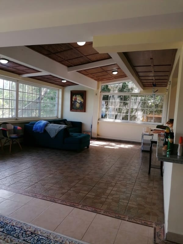 Large terrace overlooking lush forests and private garden in Cerro Azul country house Panama