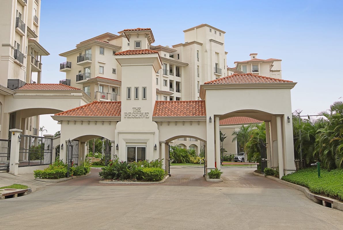 Mediterranean-style condominium towers with resort lagoon pool The Reserve Santa María
