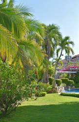 Bright bedroom with garden view in beachfront rental villa at Coronado Panama