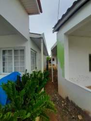 Architectural floor plan showing lot size and construction data of house for sale in Chitré Panama