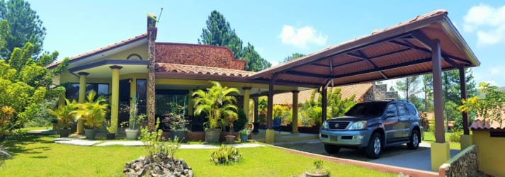 Mediterranean-style mountain home facade Granada Altos del María Panama real estate