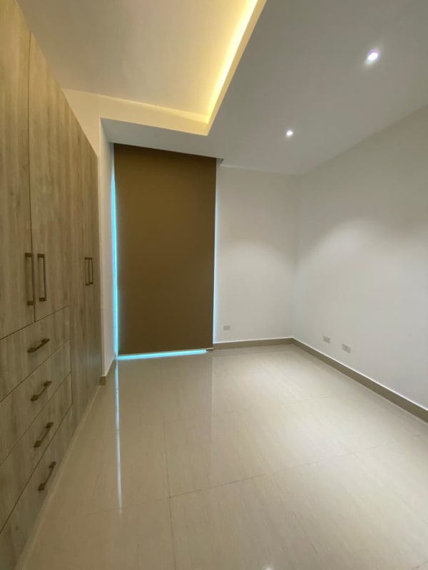 Bedroom with recessed lighting, built-in wardrobe and neutral tones at PH Green View Bella Vista