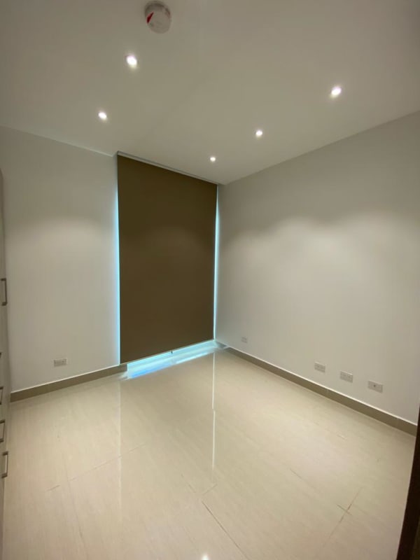 Spacious bedroom with polished tiles, recessed lighting, built-in closet PH Green View Bella Vista Panama