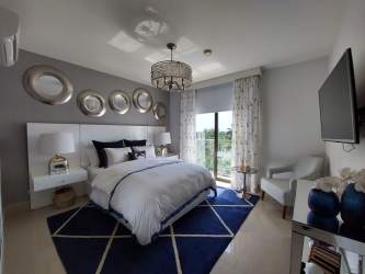 Infinity swimming pool and sunbathing area at Casamar Beach Resort Panama