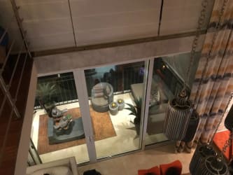 Spacious living room with TV console in luxury beachfront loft in Puntarena Buenaventura Panama