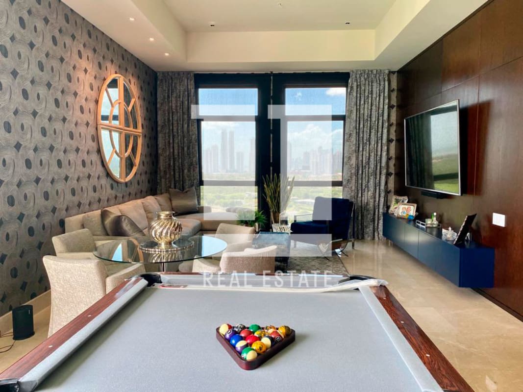 Contemporary living room and entertainment space with pool table, large windows and city views