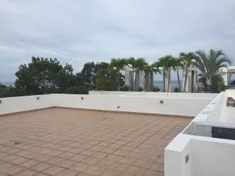 Large rooftop terrace with ocean views at Terrazas Villas Playa Blanca Panama