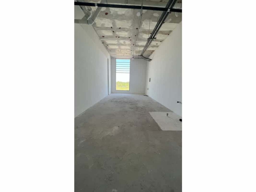 Concrete floors, exposed ceiling ducts, unfinished interior with window Costa del Este Panama