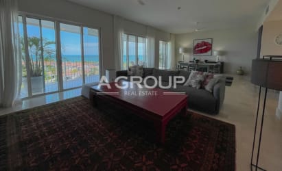 Luxury kitchen with marble counters, stainless appliances and breakfast bar at Buenaventura beach condo