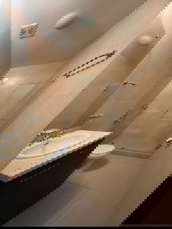 Exterior with swimming pool, balconies and landscaping in Embassy Village Clayton Panama