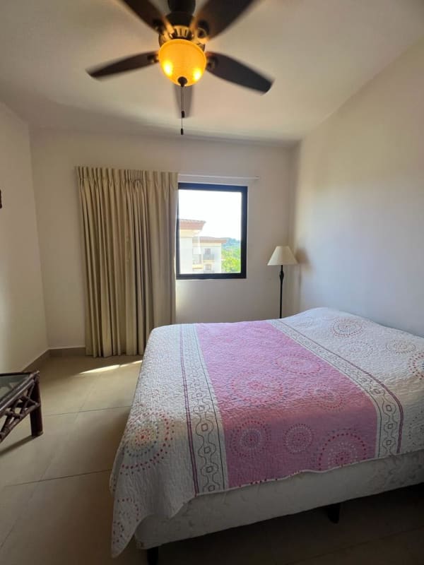 Traditional living room with balcony, ceiling fan Embassy Village Clayton Panama