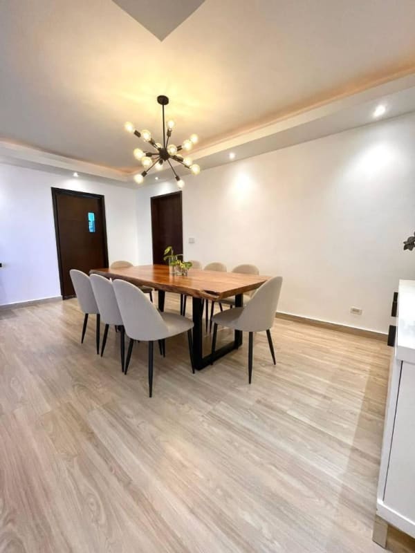 Contemporary kitchen with white cabinetry, built-in oven, gas cooktop PH Infinity San Francisco Panama
