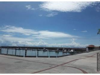 Beautiful waterfront view including yachts and the Pacific Ocean at Vista Mar Marina Panama.