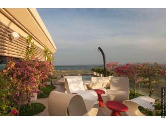 Penthouse terrace with ocean panorama and sunset views at Vista Mar Resort, Panama.