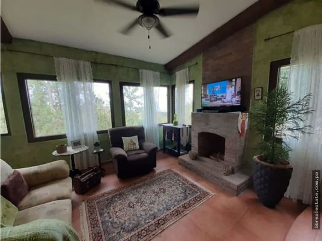 Lush garden with mature trees and mountain backdrop Cerro Azul gated community Panama