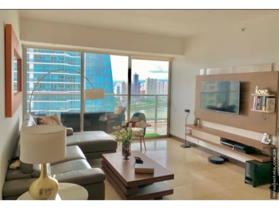 Spacious living room with panoramic ocean and city skyline views, modern decor, PH The Ocean Club Panama City