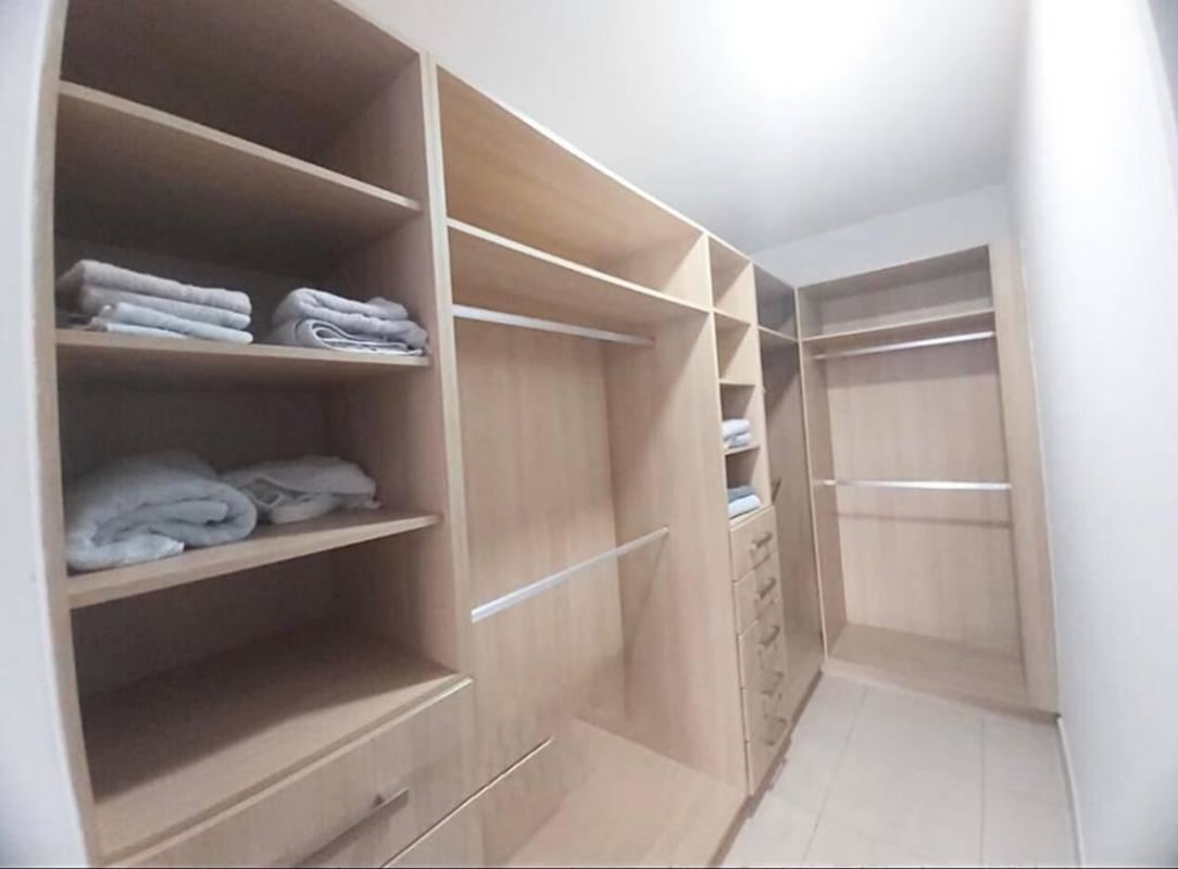 Walk-in closet built-in shelves PH Infinity apartment for sale