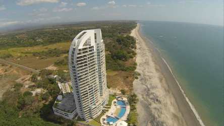 Aerial photograph of PH Santa Clara Residences beachfront high-rise towers in Panama